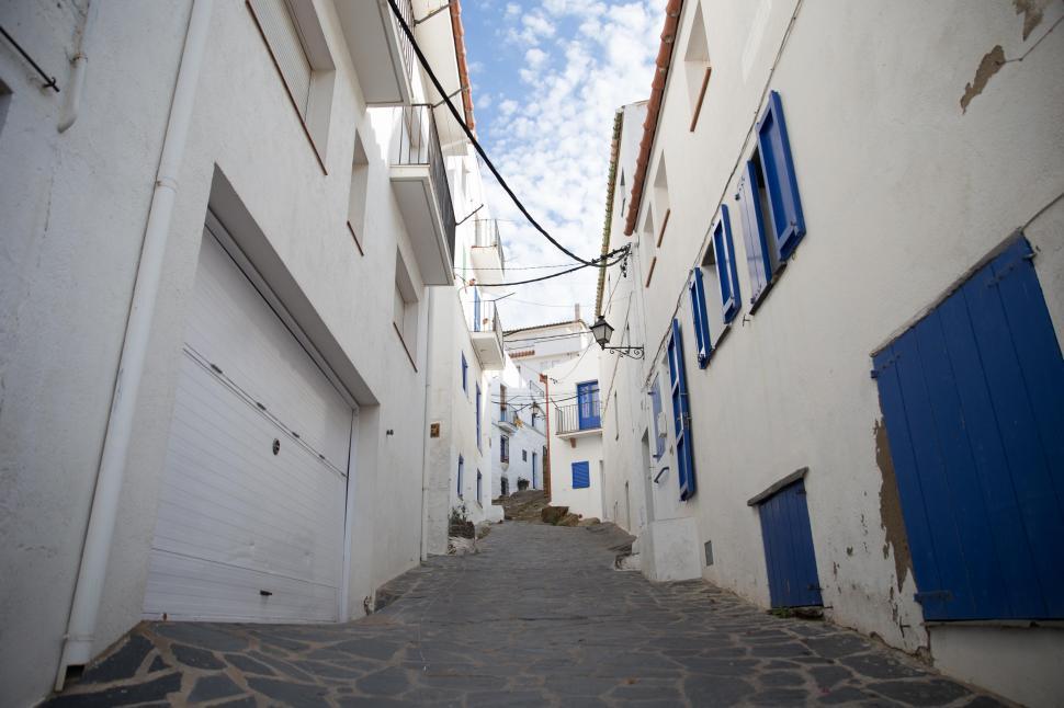 Free Image of A slope way through the alley 