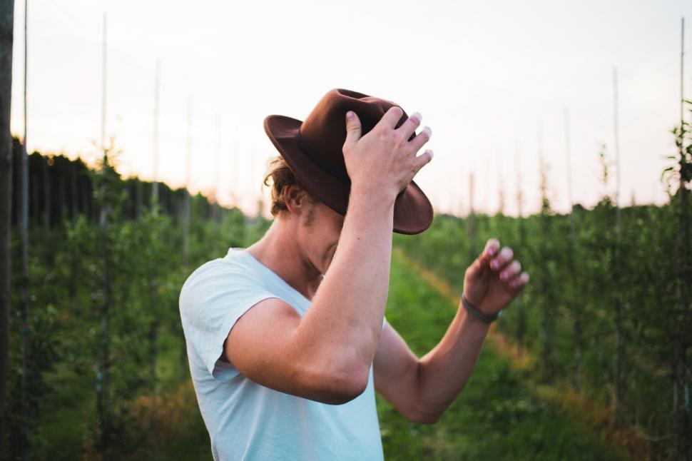 Free Image of A young Caucasian man posing in a vineyard 