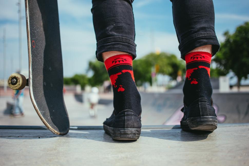 Free Image of A skateboarder standing with skateboard on the ramp 