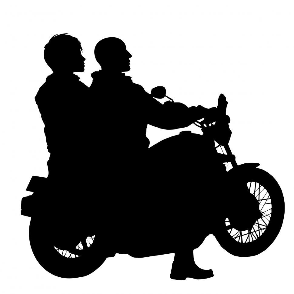 Free Image of couple riding motorcycle  