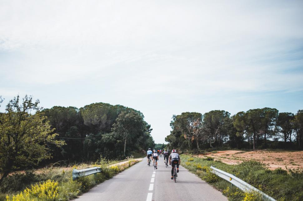 Free Image of Cyclists on a country road 