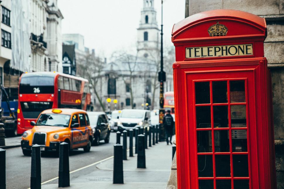 Free Image of British telephone booth on a sidewalk 