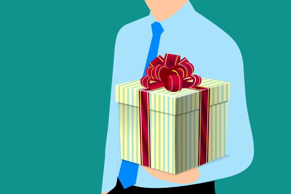 Free Image of man holding gift  