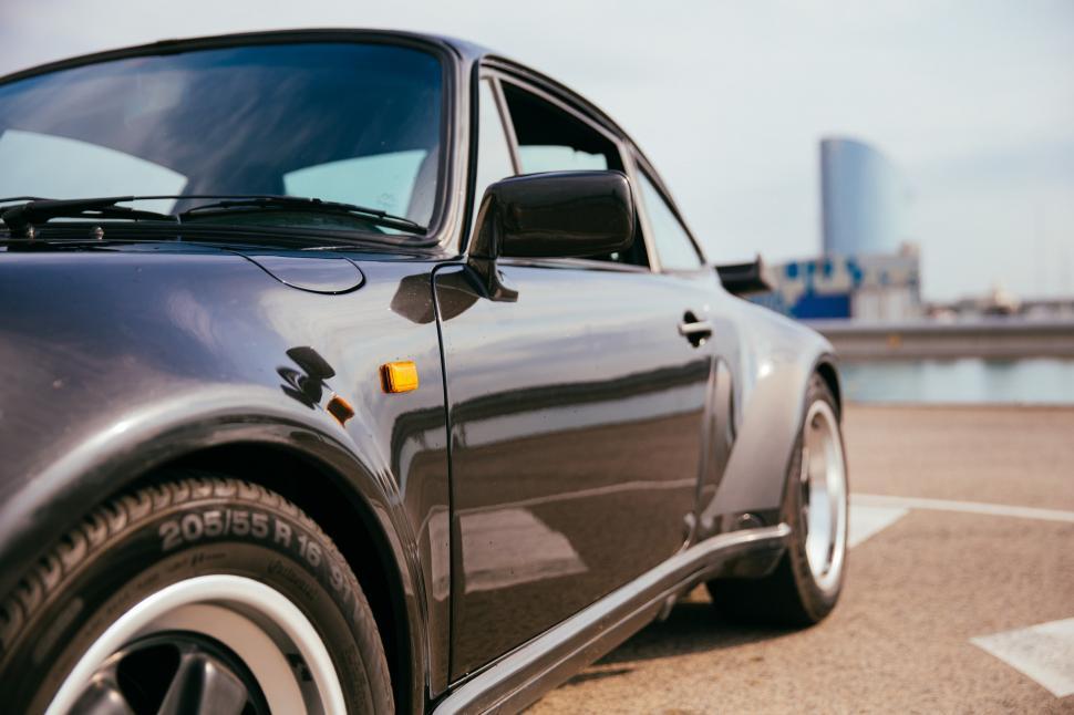 Free Image of Side view of a black sports car 