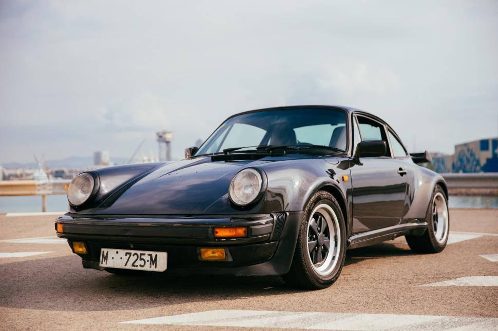 Free Image of Side view of a black sports car 