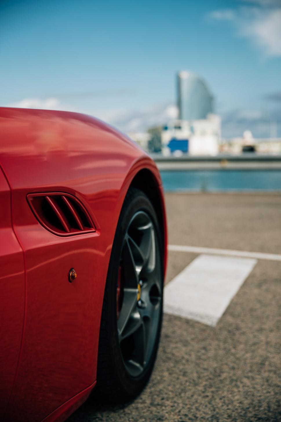 Free Image of Side view of a red sports car 
