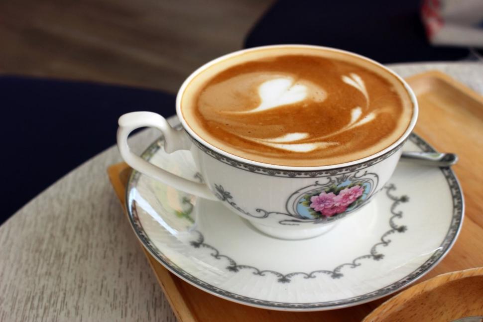 Free Image of Hot Latte Coffee with Heart Art in a Classical Porcelain Cup and Saucer  