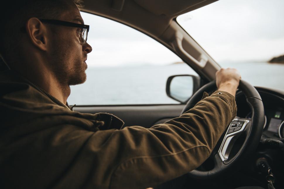 Free Image of Interior of a car driven by a Caucasian man 