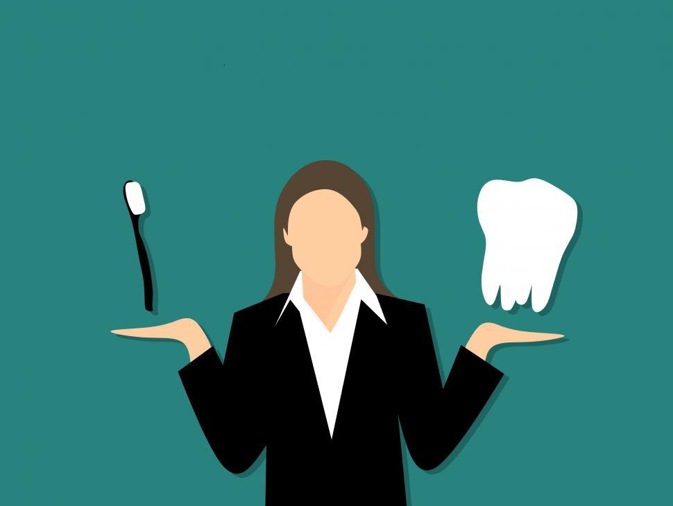 Free Image of woman holding toothbrush  