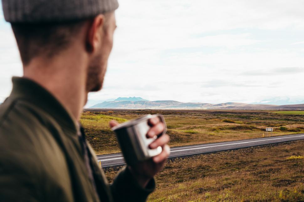 Free Image of A young Caucasian man watching road landscape 