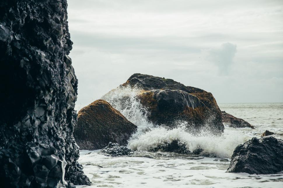 Free Image of Black volcanic rocks by the sea 