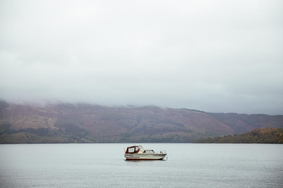 Free Image of A white boat parked in English waters 
