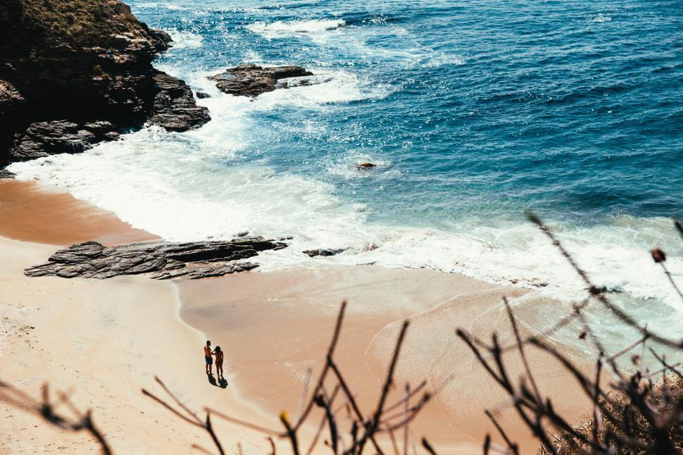 Free Image of A young Caucasian couple on the beach 