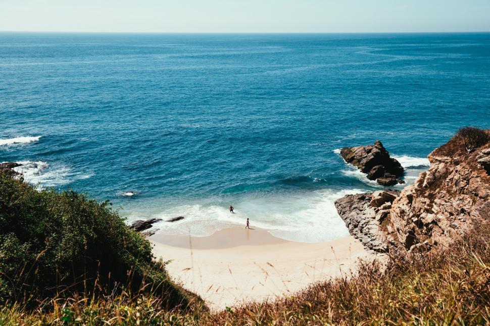 Free Image of A young Caucasian couple on the beach 