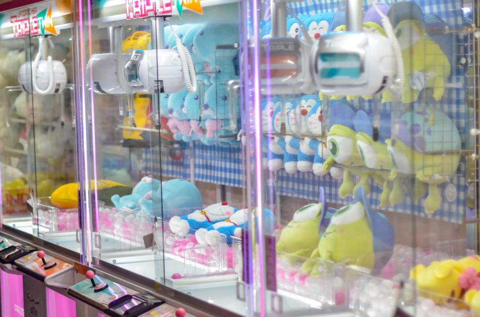 Free Image of Catch a doll game with plush prizes 
