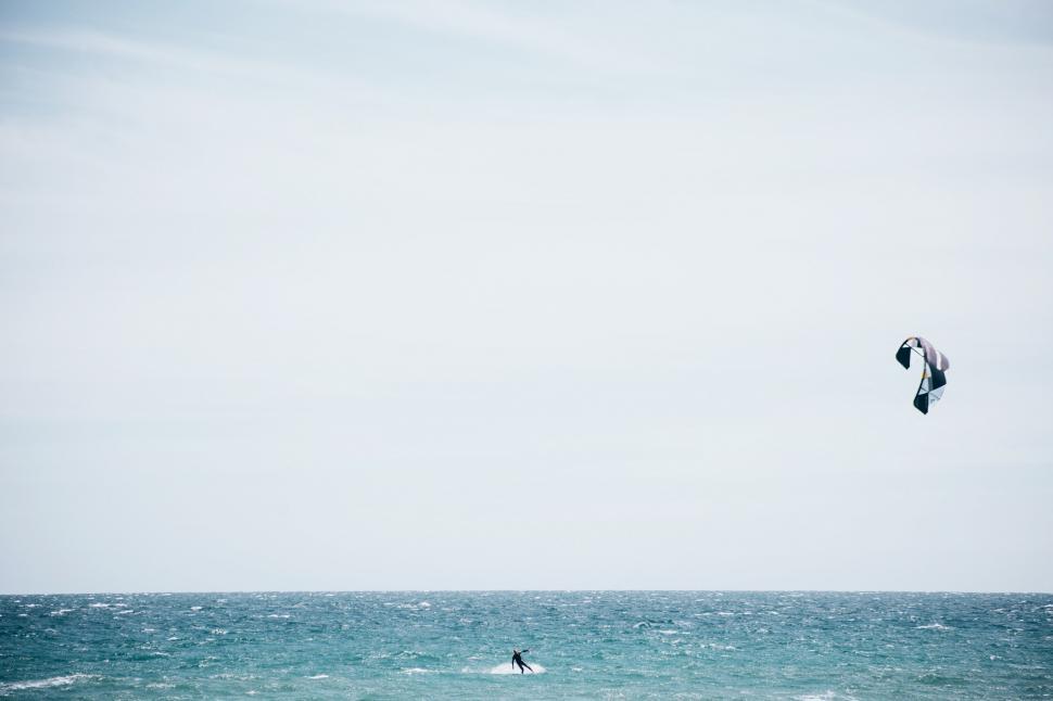 Free Image of Surfboarding with surfing kite 