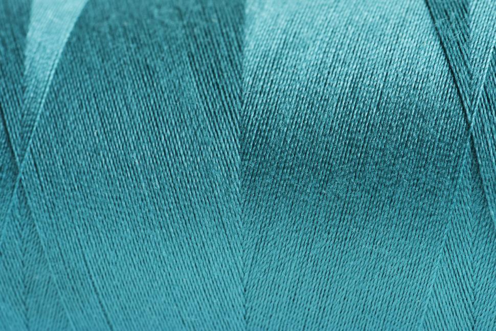 Free Image of Close-up of blue color thread texture 