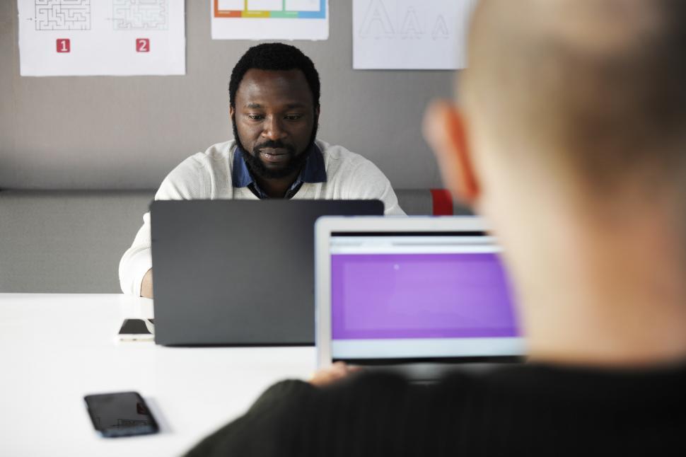 Free Image of Man working on his laptop 