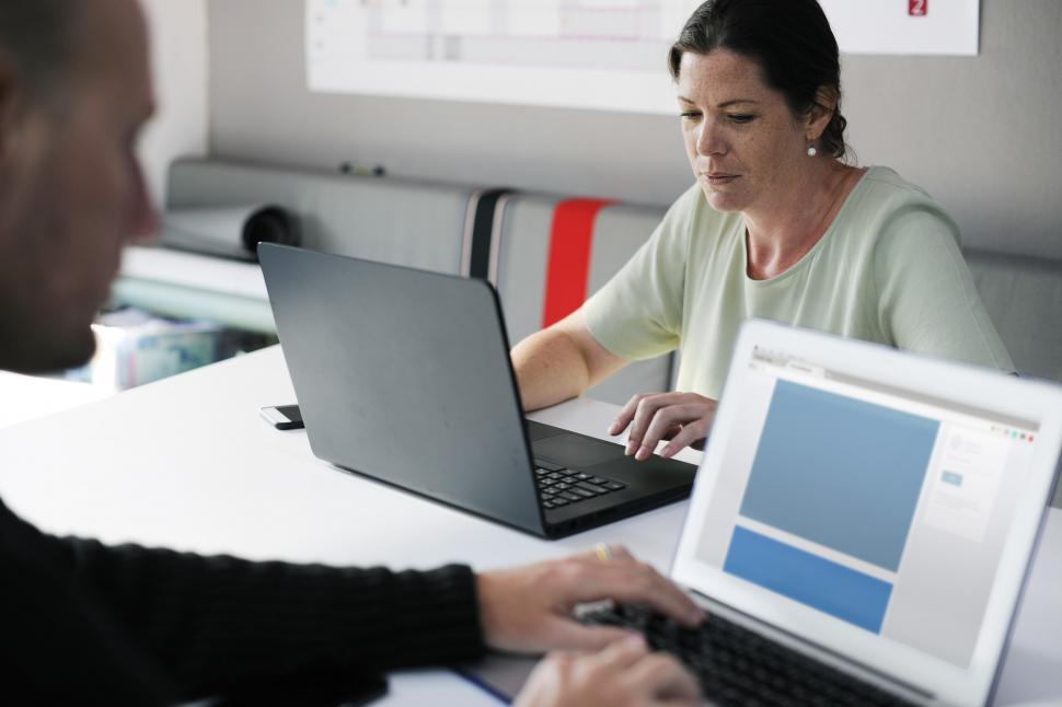 Free Image of A caucasian woman working on her laptop 