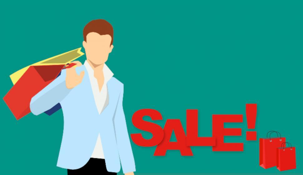 Free Image of customer holding shopping bags  