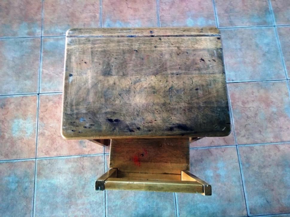 Free Image of Above view of a vintage wooden school desk and chair  