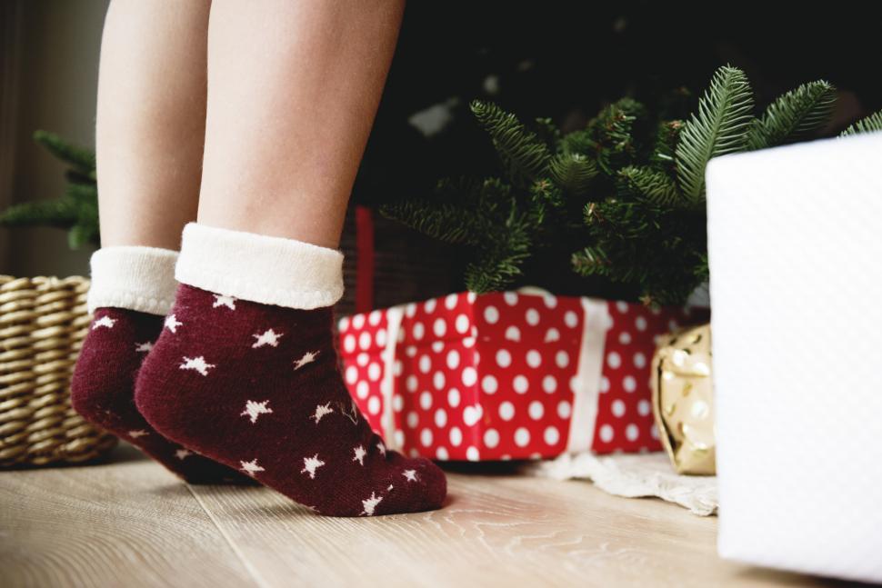 Free Image of Close up of a child s feet standing on the toes to decorate Chri 