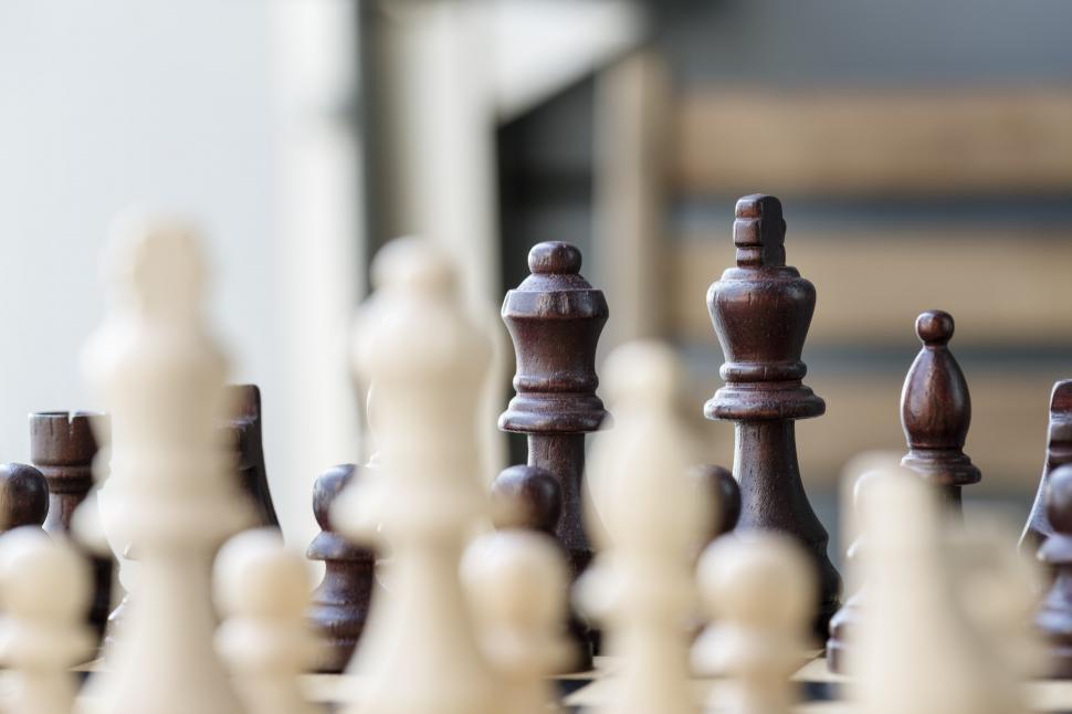 Free Image of Chess pieces with blurred foreground 