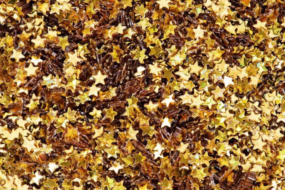 Free Image of Golden star shaped glitter sparkles 