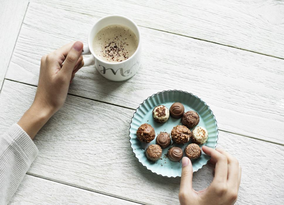 Free Image of Flat lay of chocolate candies and a coffee mug Abstract Colorful Pattern - Squares and Rectangles 