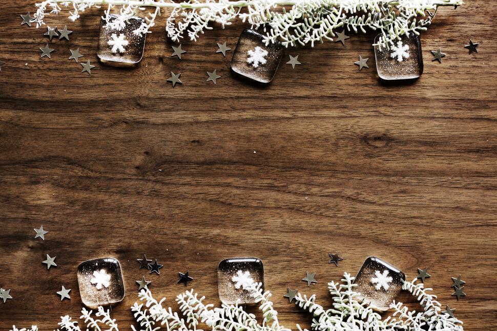 Free Image of Flat lay of Christmas decoration items on wooden tabletop 