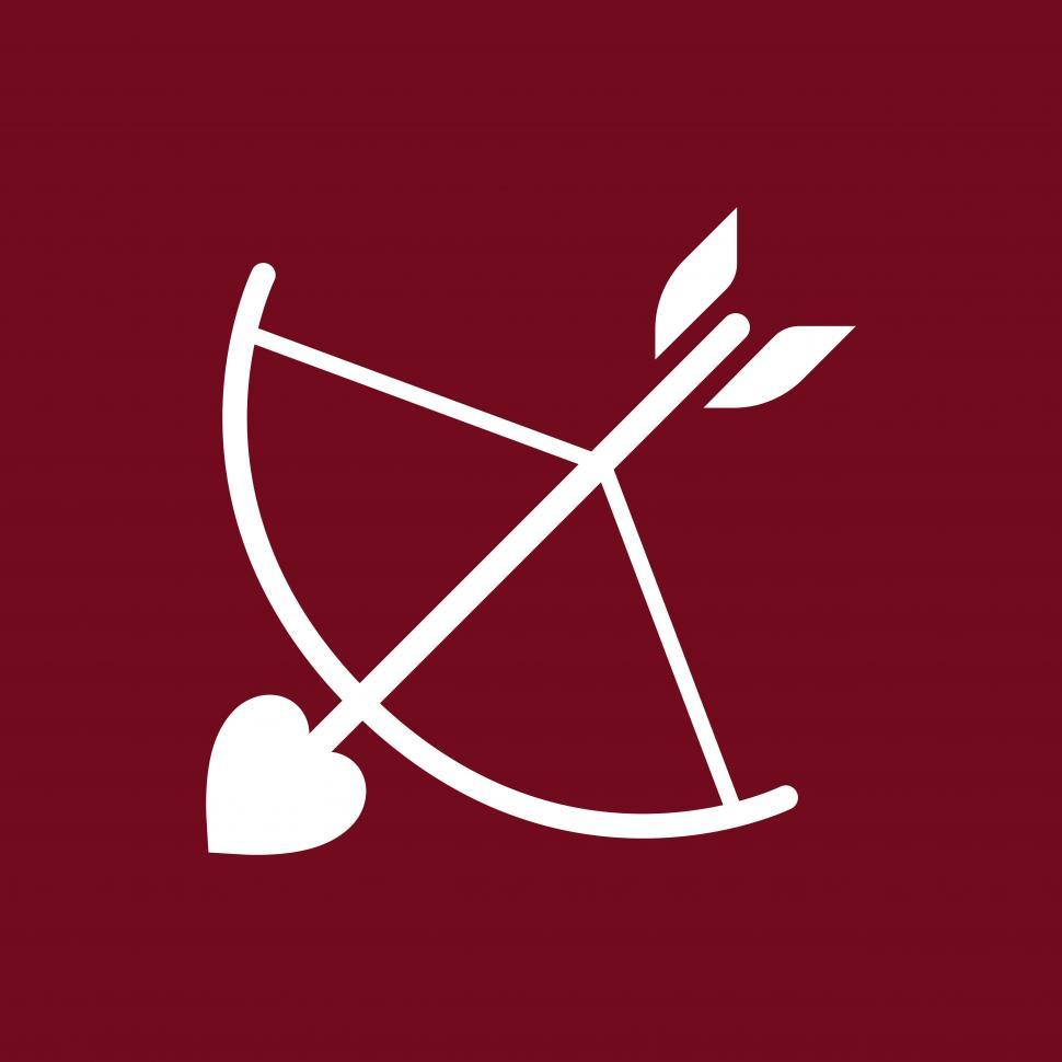 Free Image of A cupid bow and an arrow with a heart 
