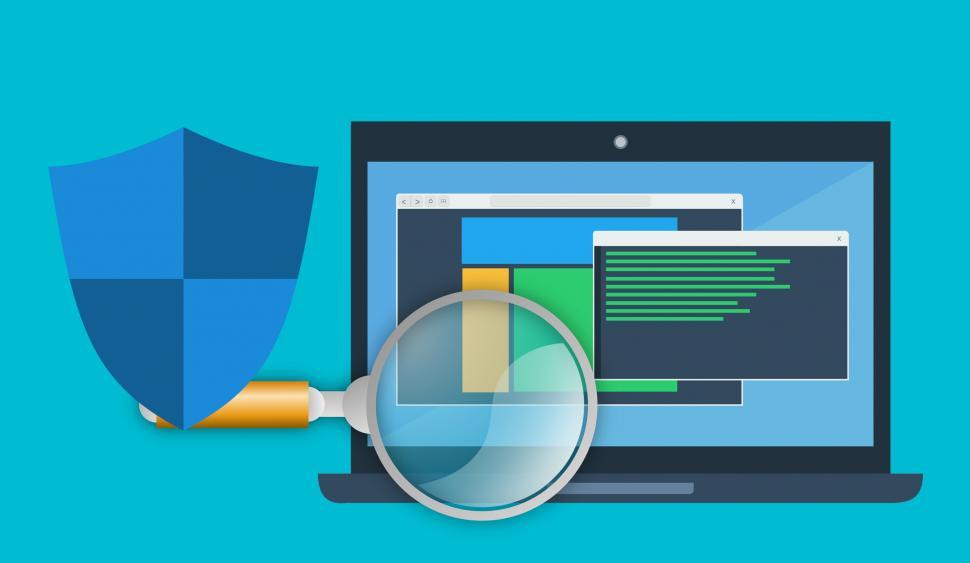 Free Image of Laptop With Magnifying Glass 