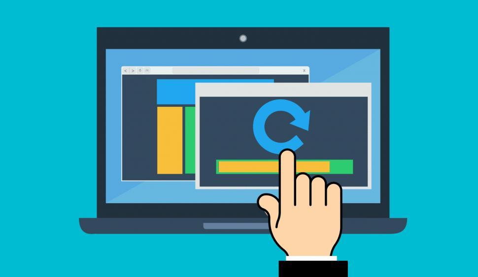 Free Image of Person Touching Computer Screen With Hand 