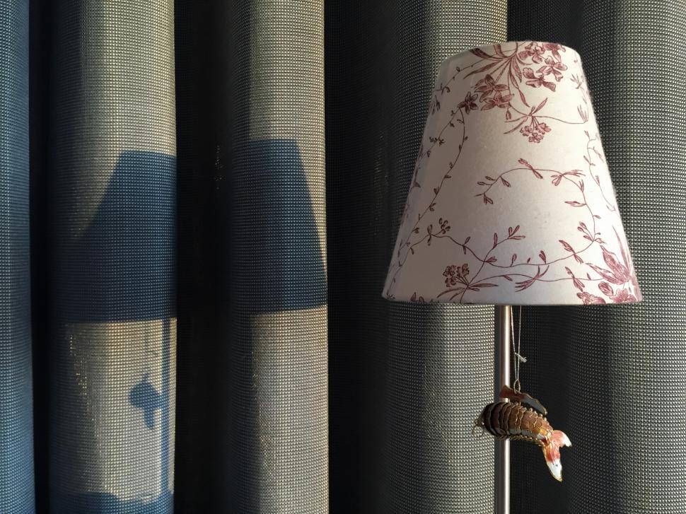 Free Image of The nightstand lamp at sunset  