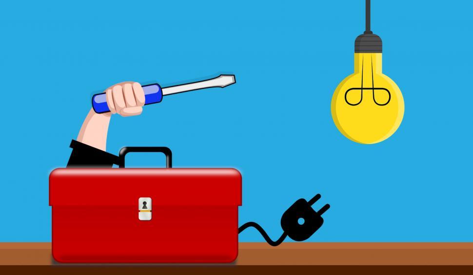 Free Image of Electrician fixing lightbulb  
