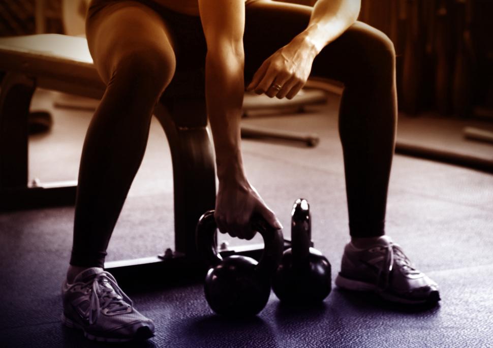 Free Image of Woman Lifting Kettlebells 