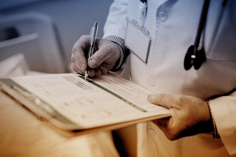 Free Image of Doctor Writing Prescription 