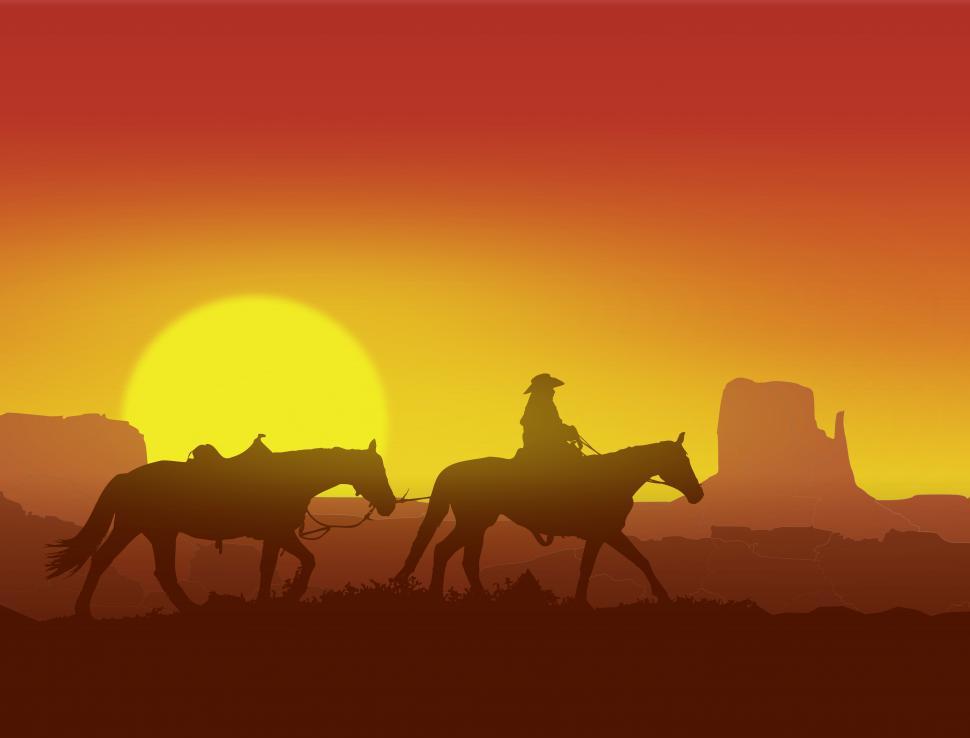 Free Image of Lone Cowboy at Sunset in Monument Valley - Wild West Concept 