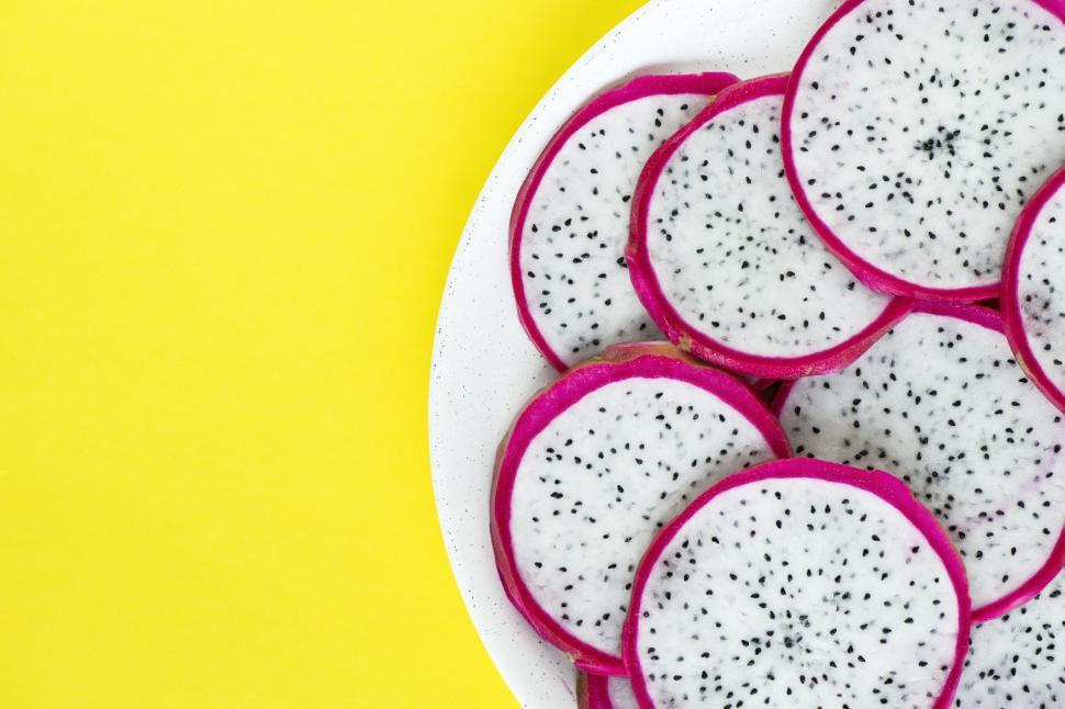 Free Image of Flat lay of dragon fruit slices 
