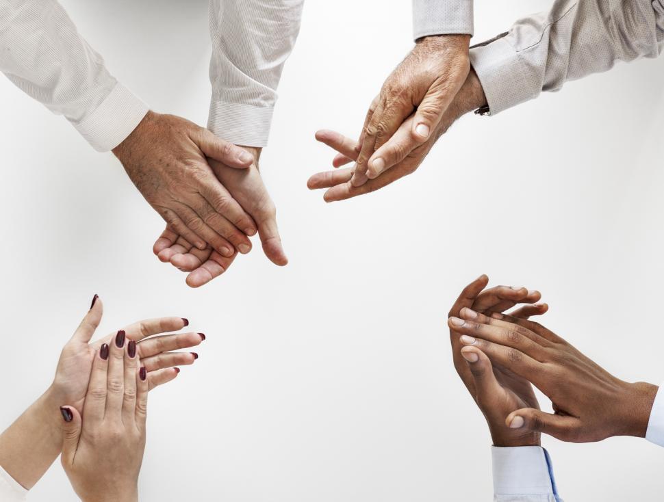 Free Image of Over the head view of multiethnicity hand clapping 