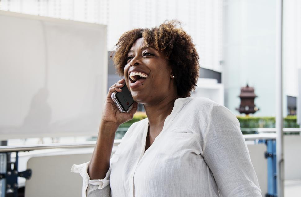 Free Image of A young African ethnicity woman talking on her mobile phone 