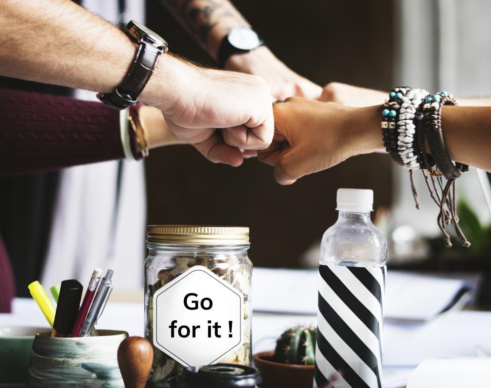 Free Image of A business team Giving Fist Bump in agreement 