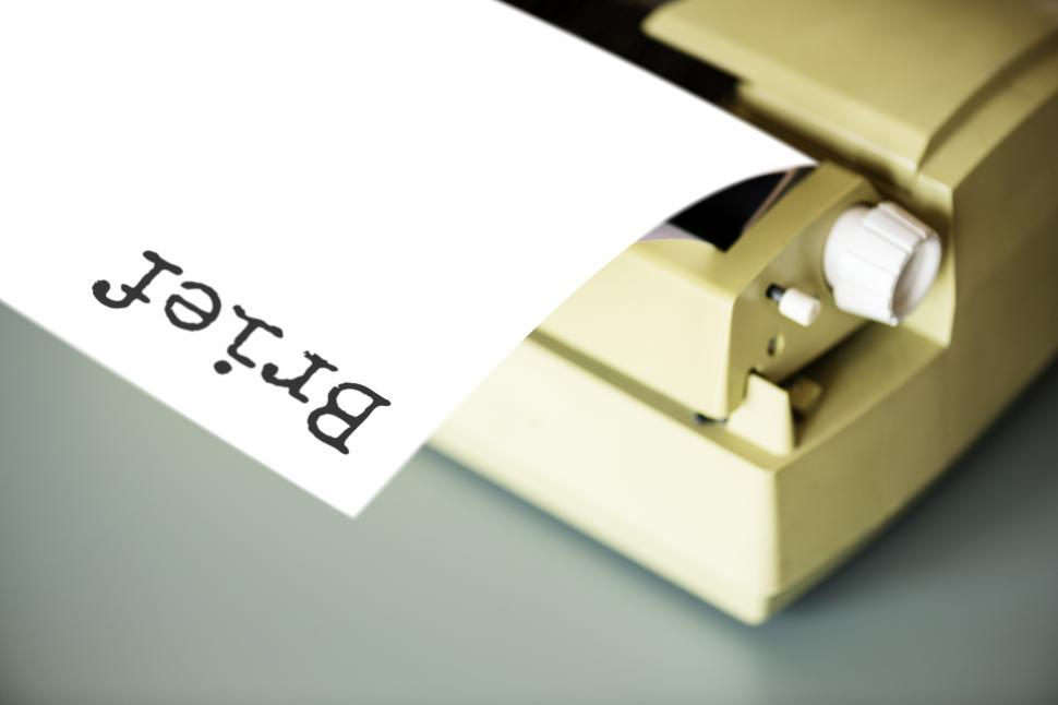 Free Image of Close up of a paper coming out of a typewriter 
