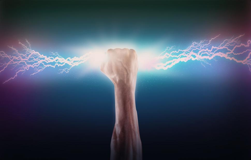Free Image of Clenched Fist Grabbing Lightning Bolt - Ambition and Determinati 