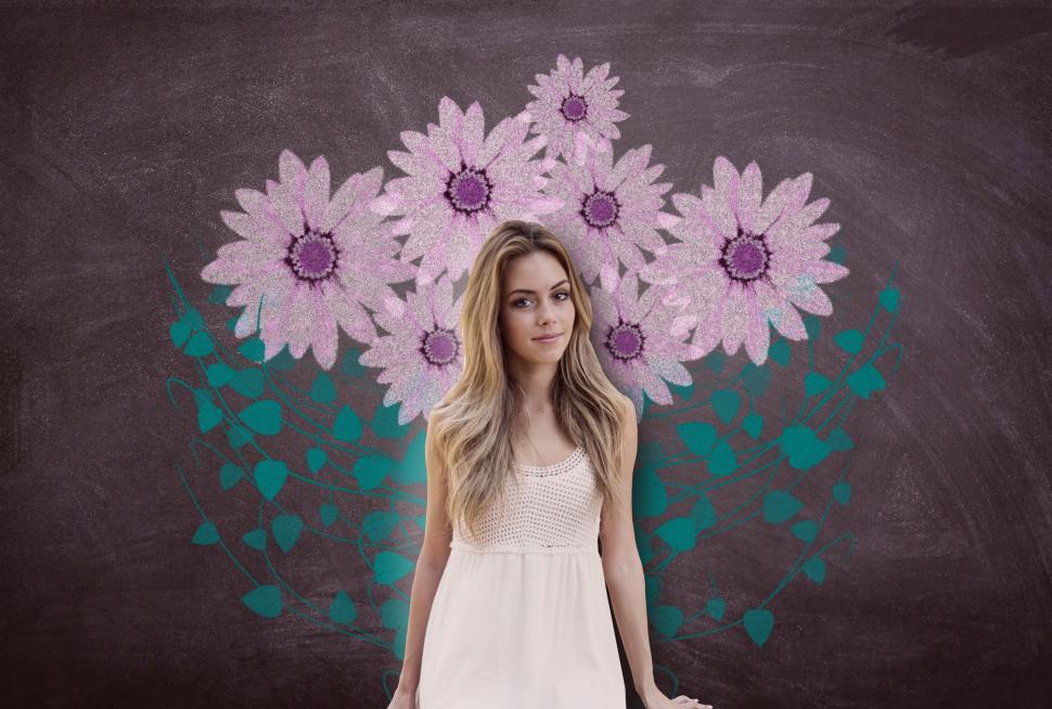 Free Image of Attractive Young Woman Over Blackboard with Flowers 