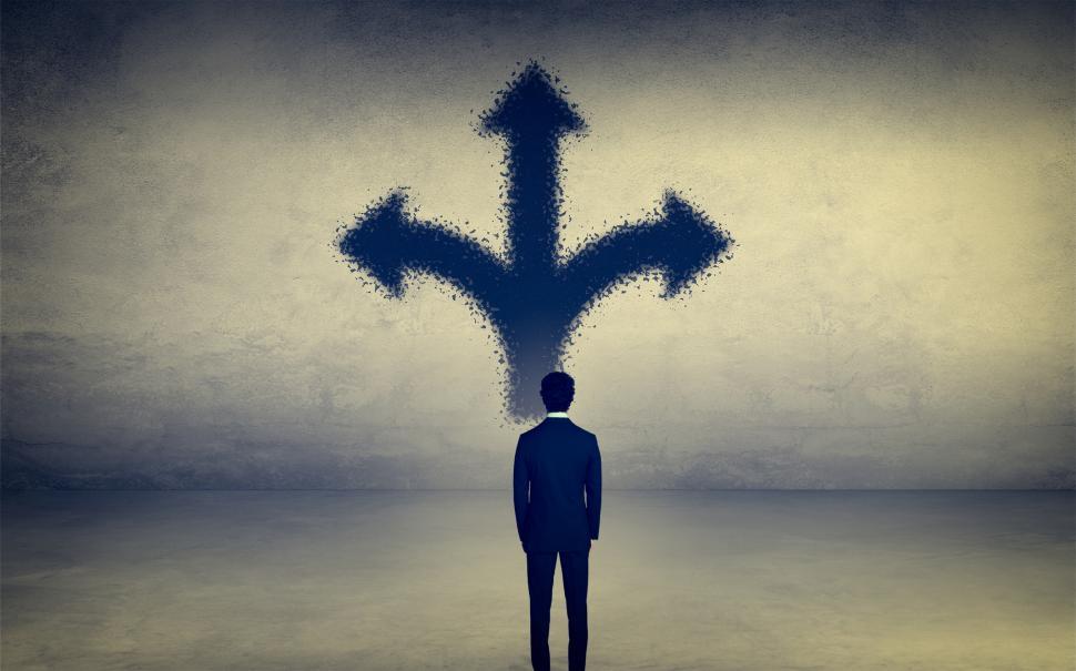 Free Image of Which Way to Go - A Man Facing Choices and Options 
