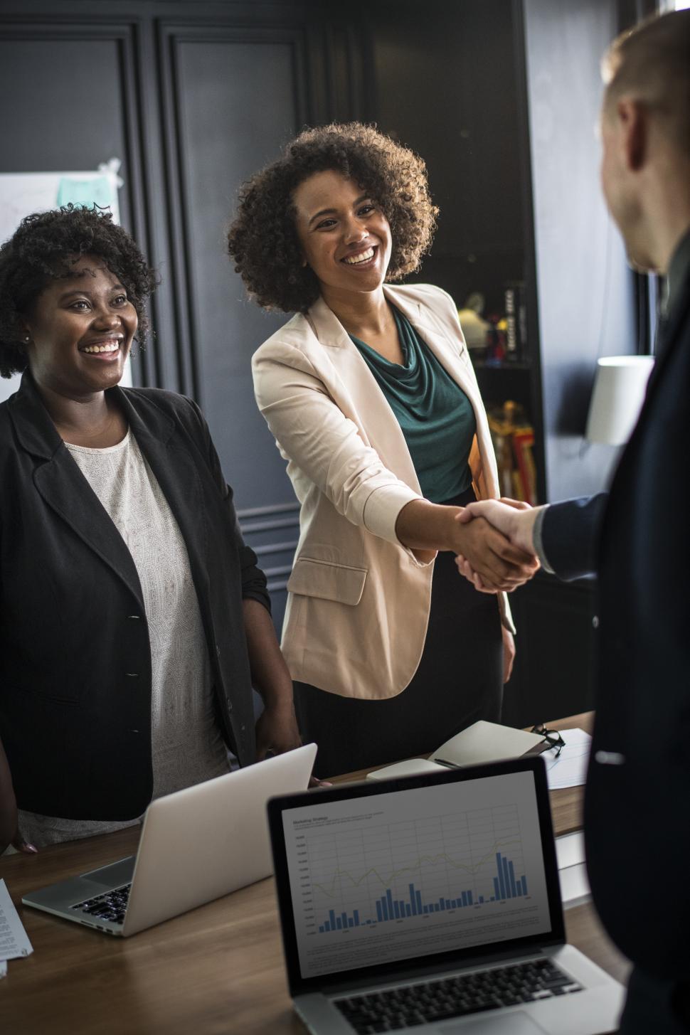 Free Image of Multiethnic colleagues in business setting 