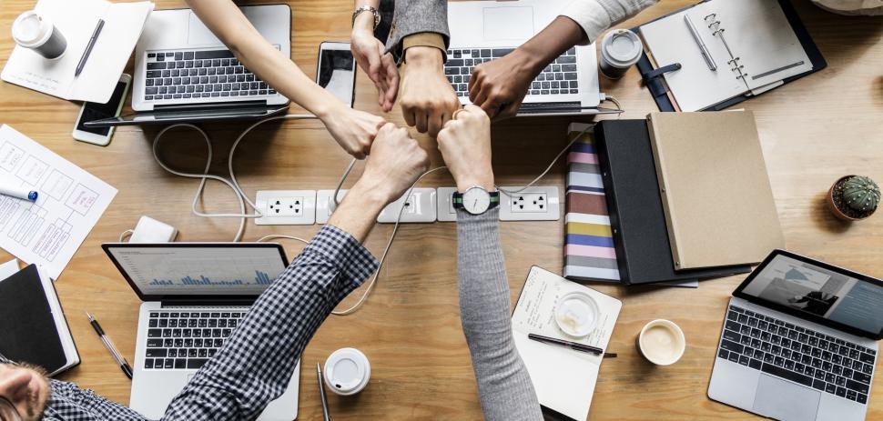 Free Image of A business team giving Fist Bump in agreement 