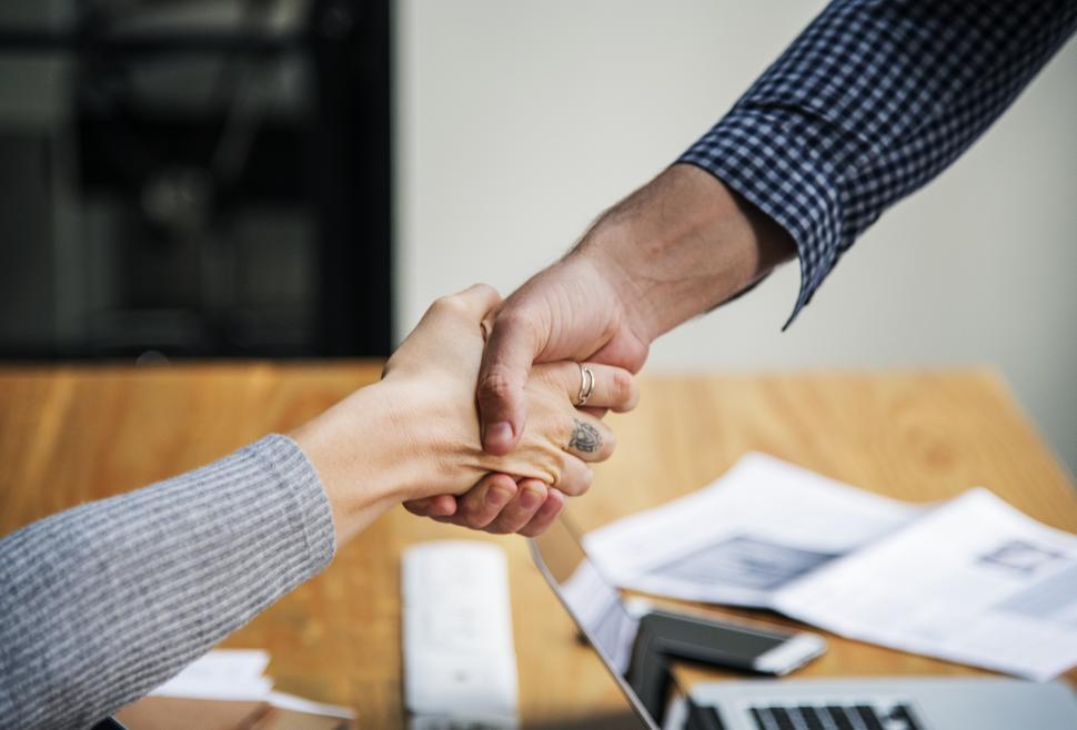 Free Image of Closeup handshake between two business people 