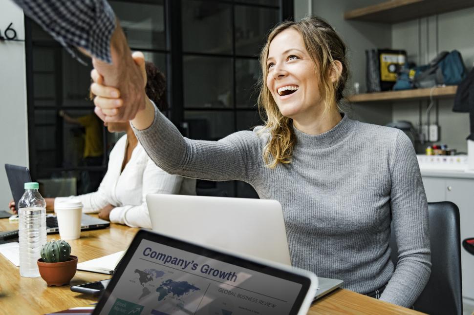 Free Image of Woman shaking hands 